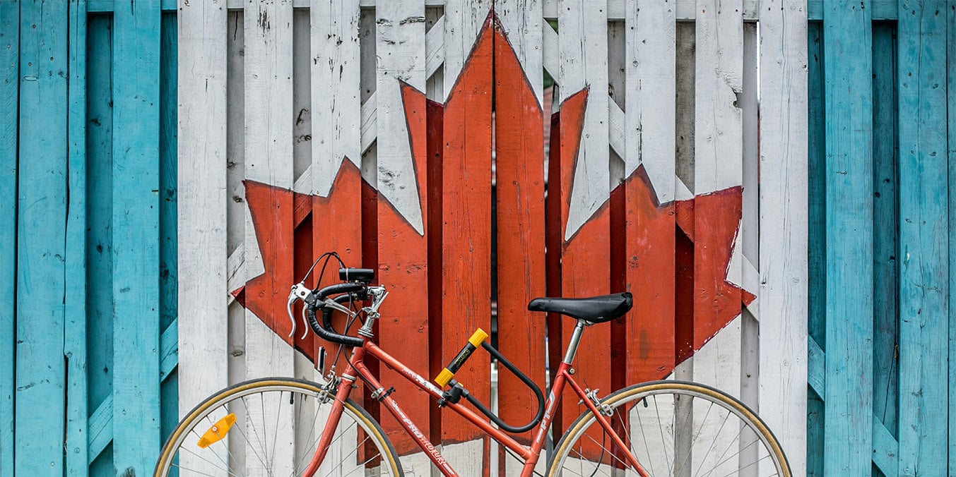 bike against a painted wall; What is Canada famous for?