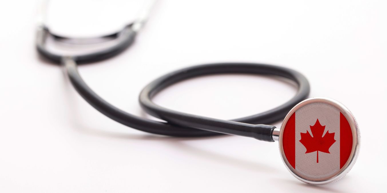 Stethoscope with a Canadian flag emblem, symbolizing ways to save on healthcare costs in Vancouver, Canada