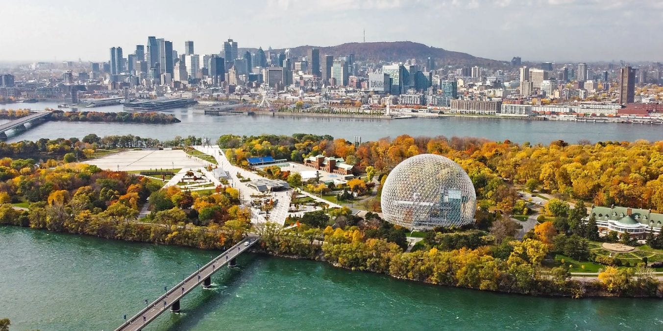 Aerial view of Montreal highlighting its vibrant economic landscape, featuring key landmarks that symbolize the city's focus on high-tech innovation and cultural exports in industries like gaming and animation