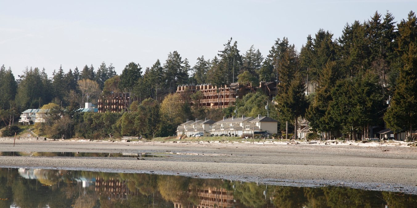 Beachfront homes and lush greenery in Parksville, illustrating why it's considered one of the best places to live on Vancouver Island