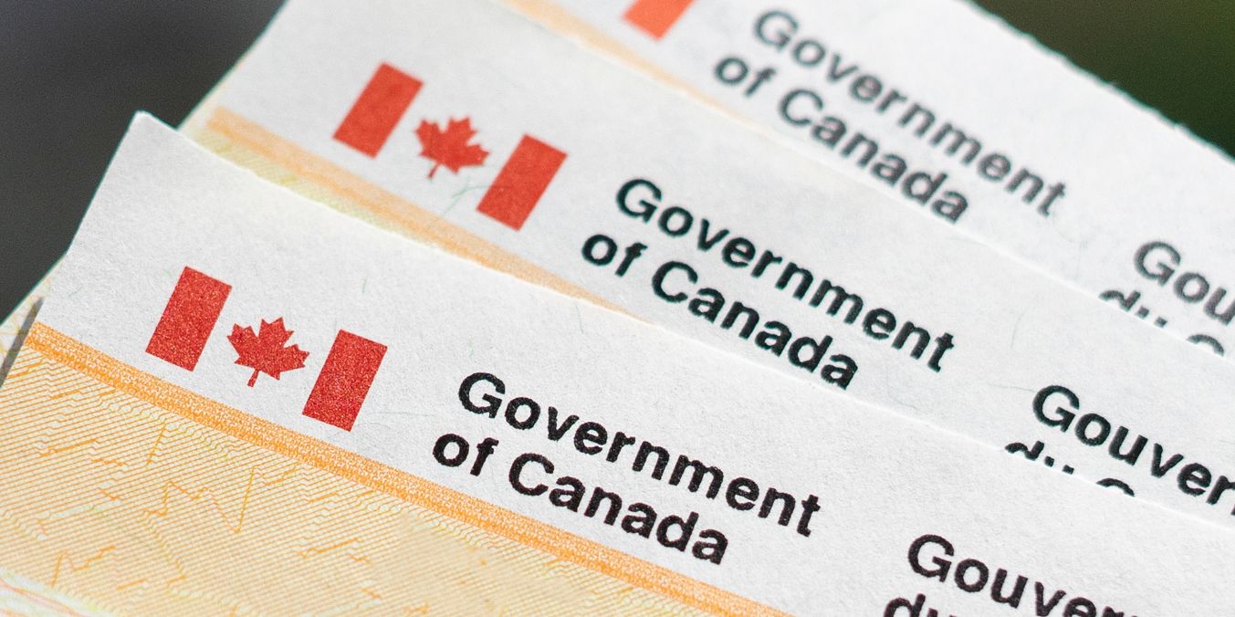Close-up of Canadian government tax forms, emphasizing the importance of understanding various taxes and levies in Vancouver for 2024