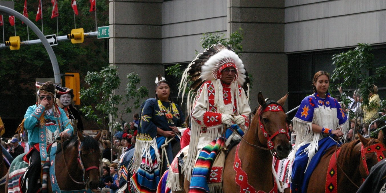 Indigenous participants at the Calgary Stampede, showcasing what Calgary is known for in cultural heritage and community spirit
