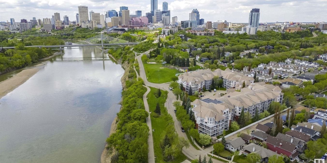 Aerial view of Riverdale, Edmonton, showcasing its proximity to the Edmonton River, lush greenery, showcasing as one of the best neighborhoods.