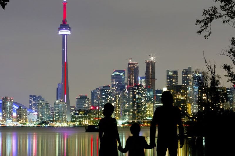 Toronto skyline at night, showcasing as one of the best neighborhoods in Toronto for various lifestyles and amenities.