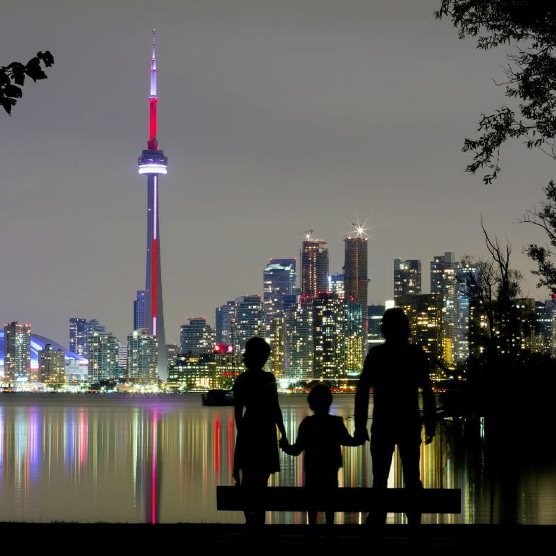 Toronto skyline at night, showcasing as one of the best neighborhoods in Toronto for various lifestyles and amenities.