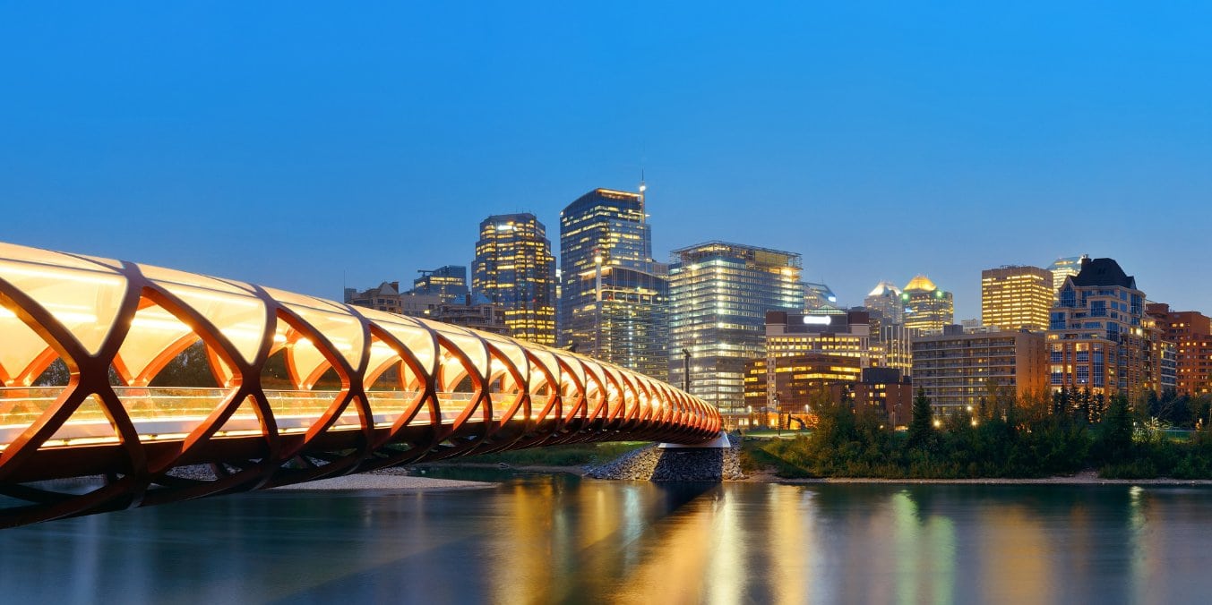 Calgary skyline at dusk with the Peace Bridge, highlighting why Calgary is the best place to live in Alberta