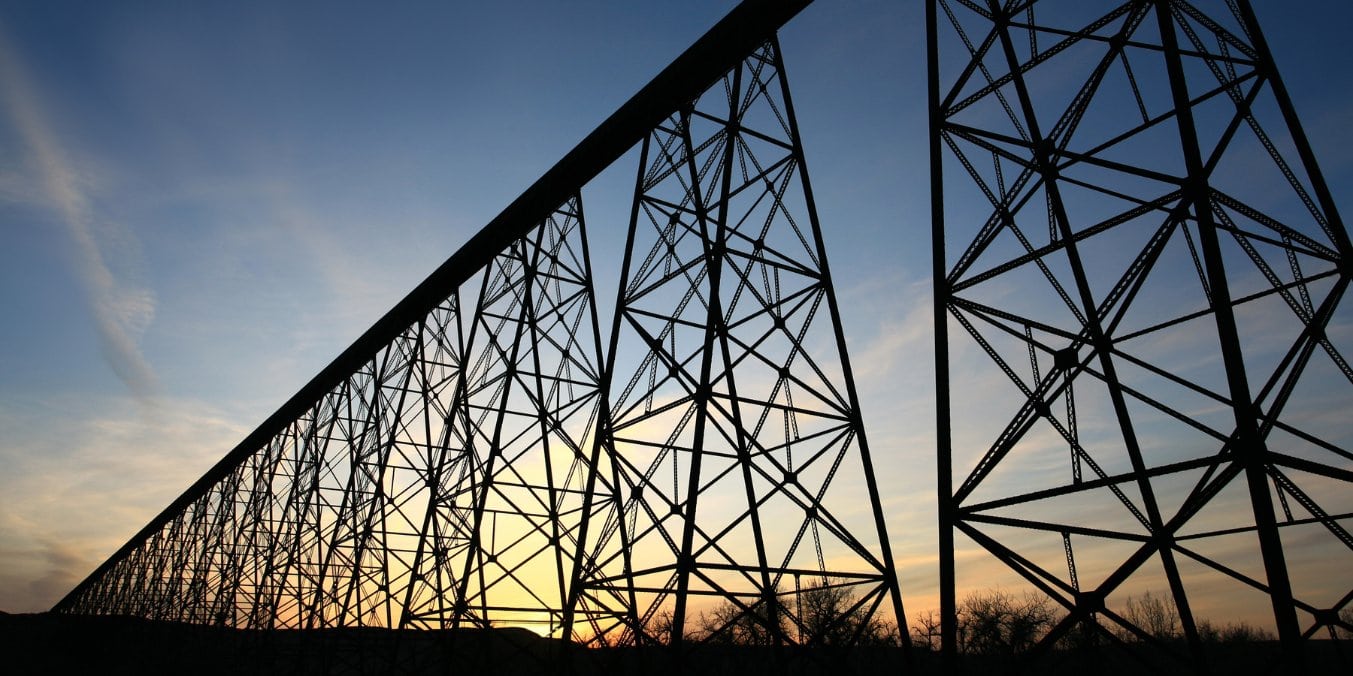 Lethbridge's iconic High Level Bridge at sunset, representing why Lethbridge is the best place to live in Alberta