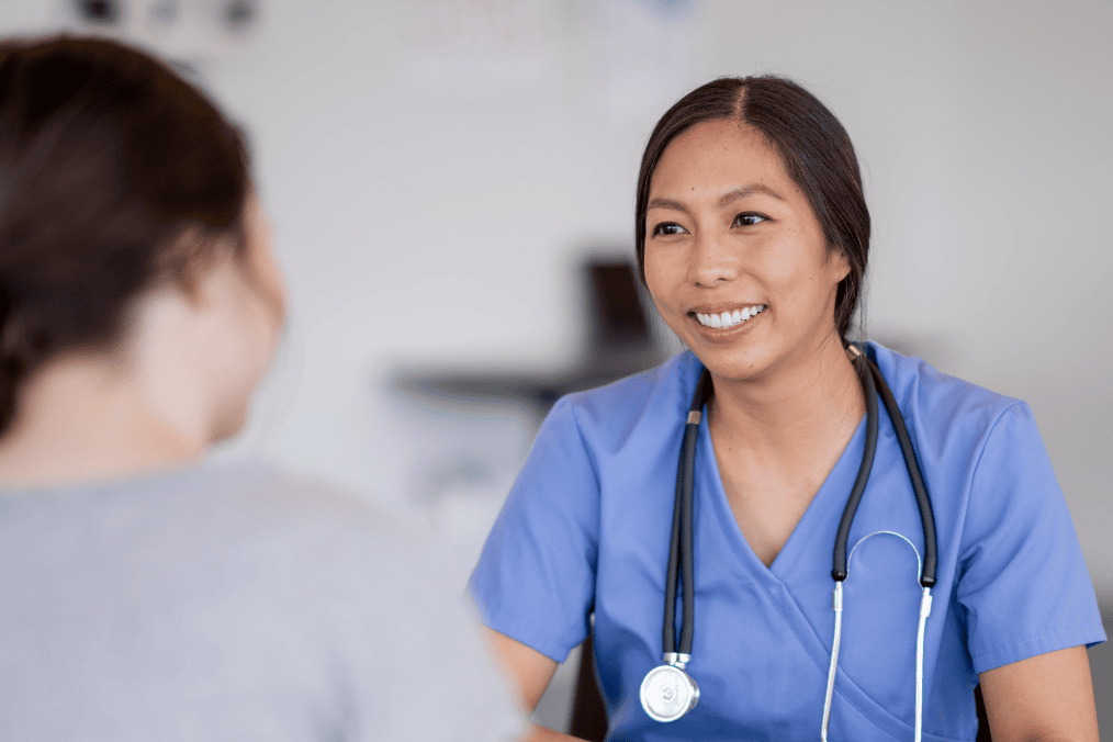 A nurse conducting a medical exam for Canada immigration.