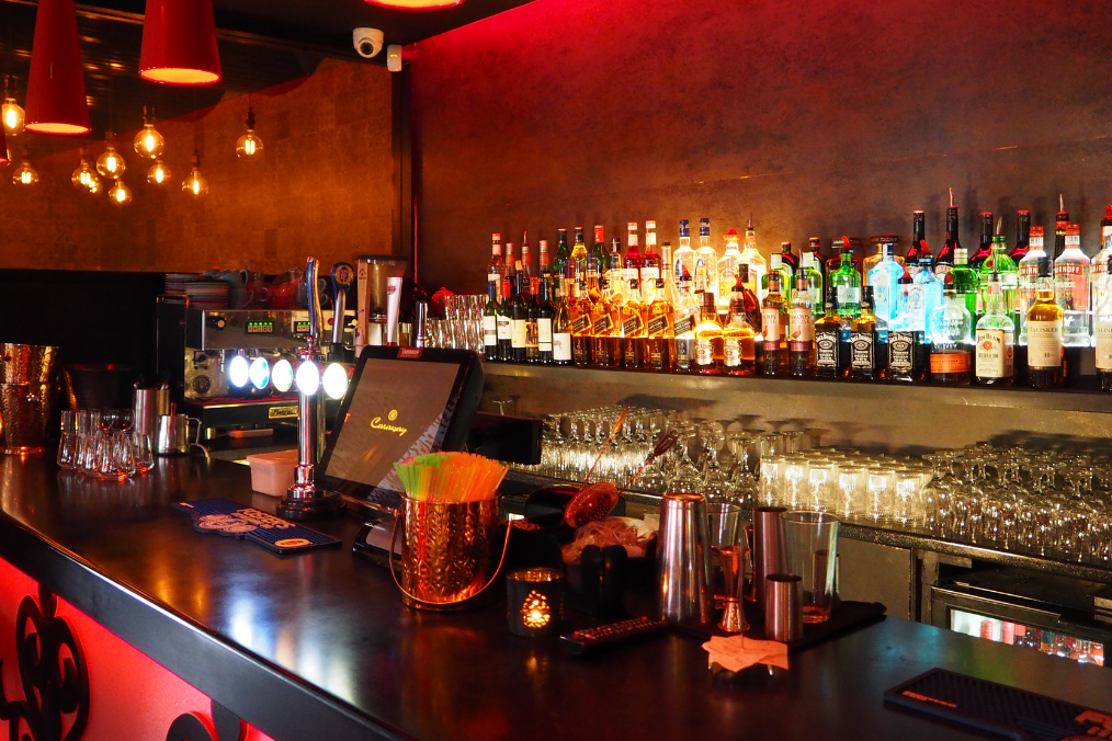 Cozy bar in Canmore offering a vibrant nightlife experience with a wide selection of drinks.