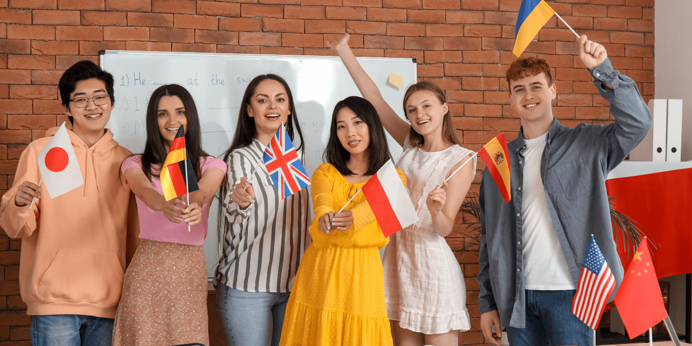 A group of international students preparing for the language requirements for Express Entry to Canada, each holding flags representing their home countries, showcasing diversity and multilingualism in immigration pathways.