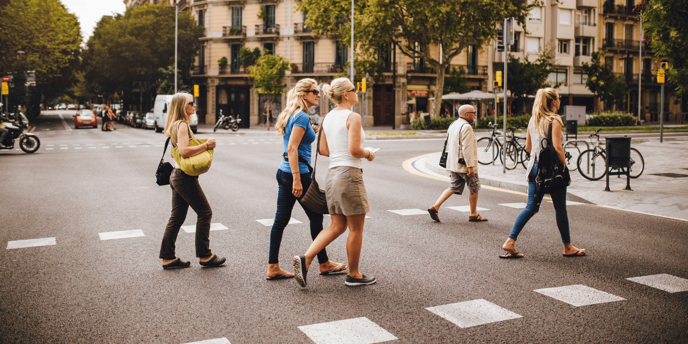 People walking safely through a pedestrian-friendly area, reflecting the lifestyle in some of the safest cities in Canada.