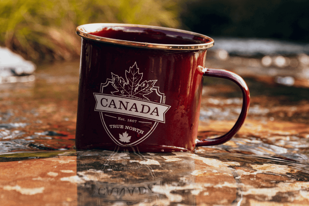 Red Canada-themed mug labeled 