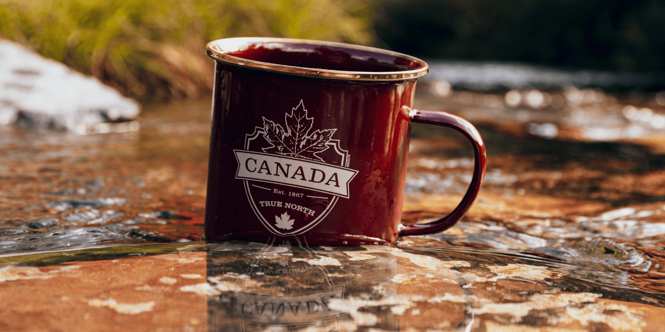 Red Canada-themed mug labeled 